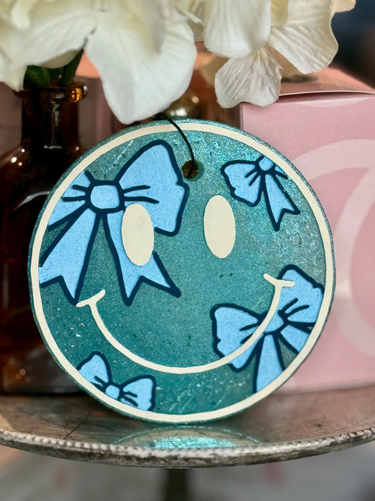 Blue Bow Smiley Freshie - Scent: Black Ice